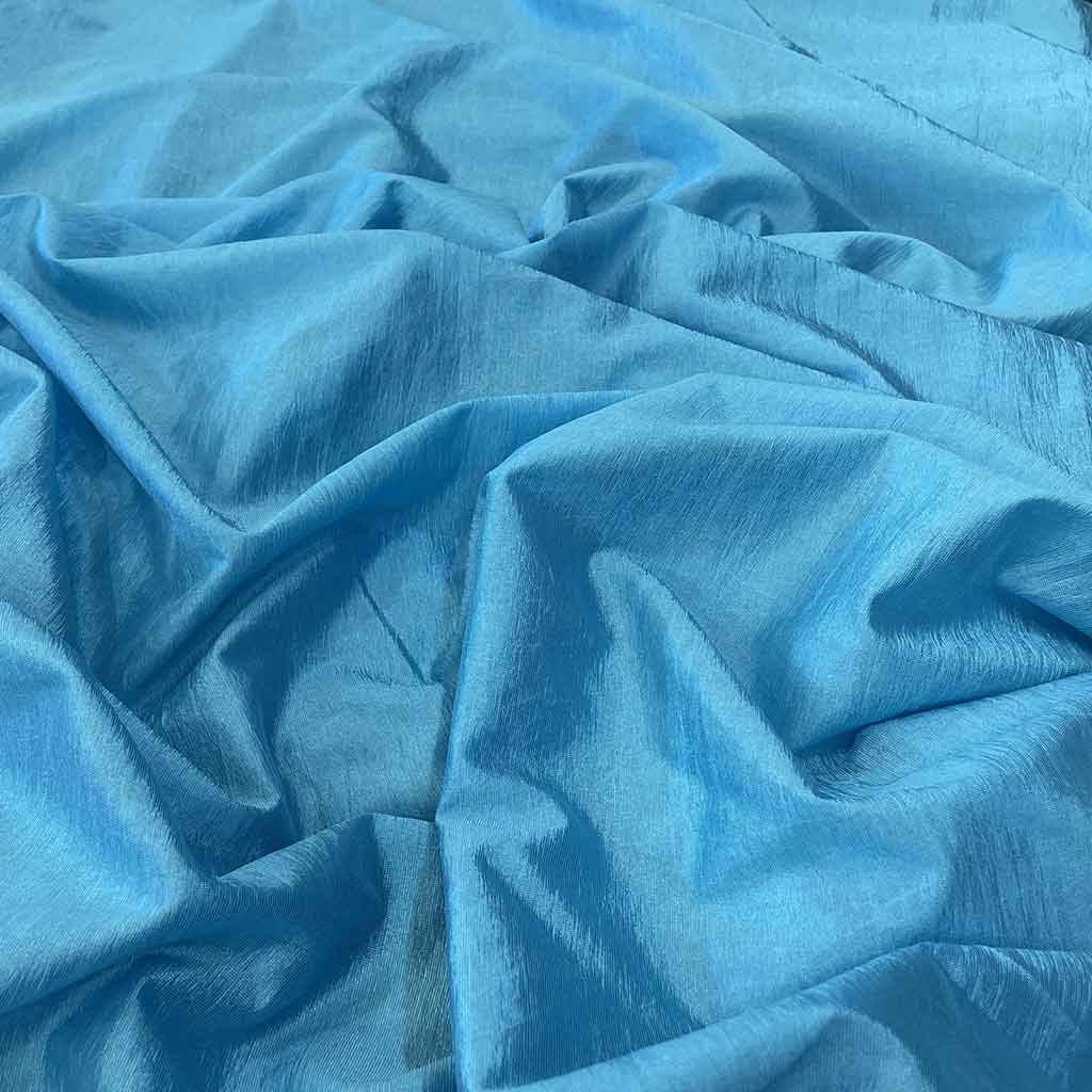 پارچه استری ژرسه فیروزه ای ساده