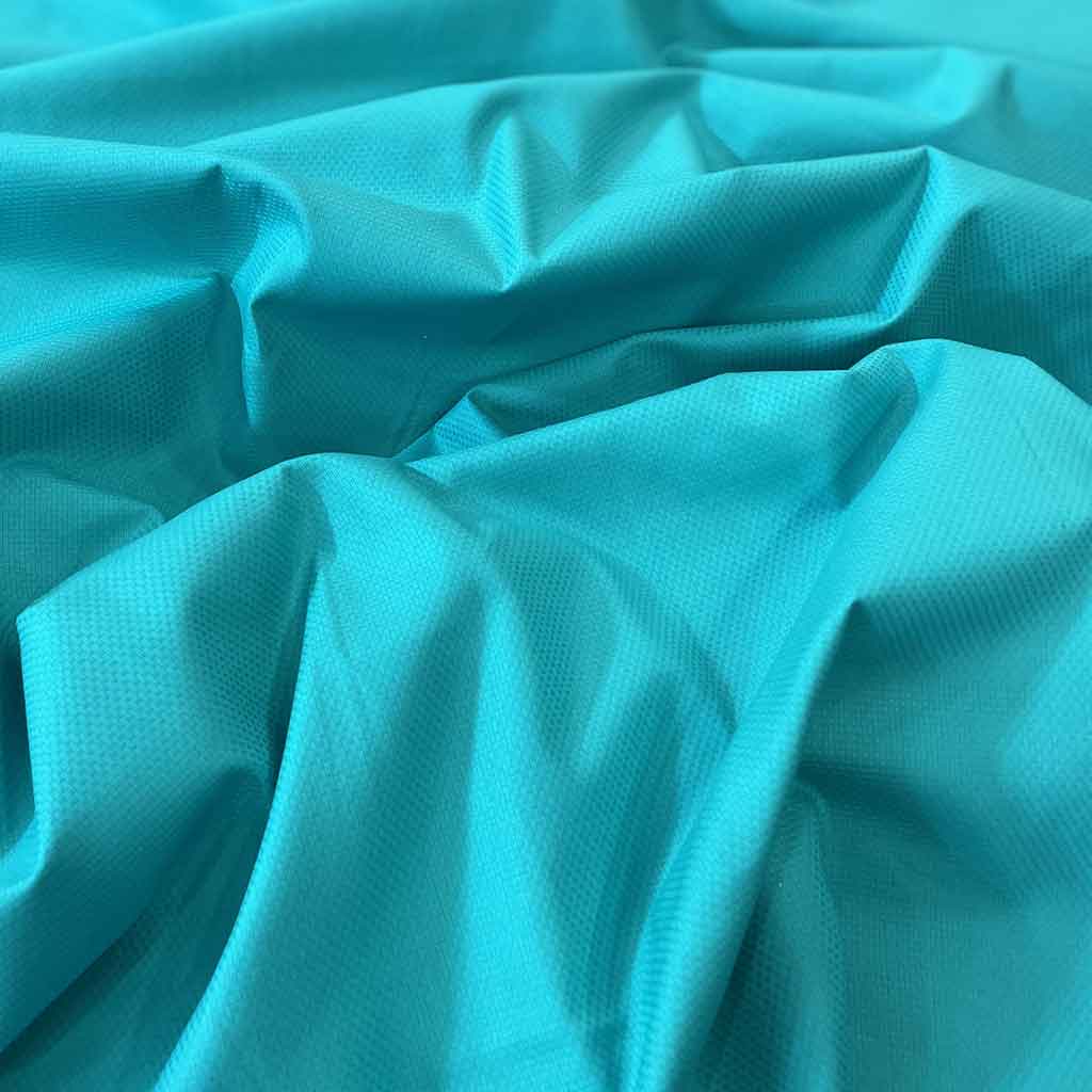 پارچه نخی ساده رنگی سبز آبی