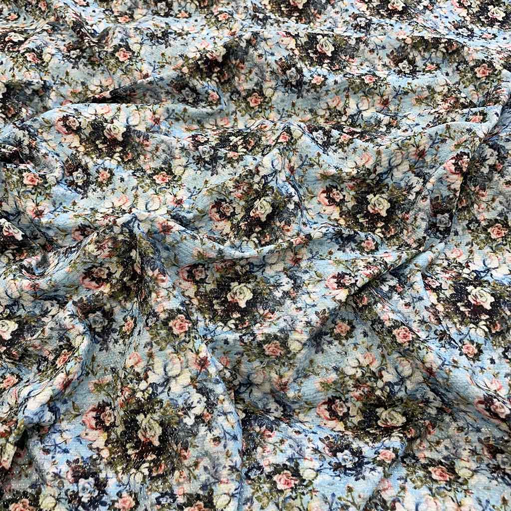 پارچه لمه طرحدار آبی گل سفید
