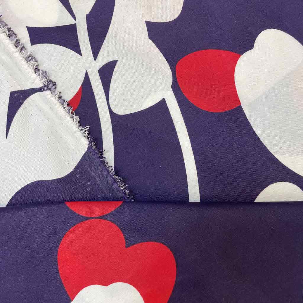 پارچه ملحفه ای بنفش طرح گل سفید